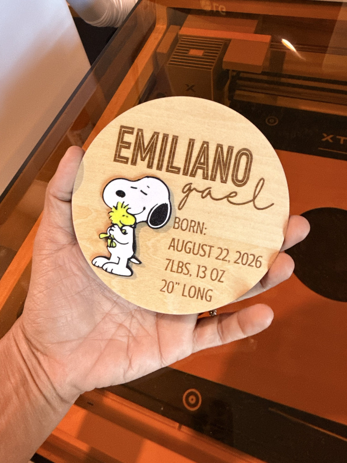 Example of a personalized round wooden baby birth stats keepsake